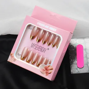 French tip press-on nail kit with pink pearlescent base and gold accents in elegant box