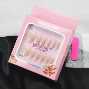 Glossy nude pink press-on nail set in premium window box with nail file and adhesive