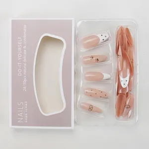 Detailed set of long almond press-on nails with pink gradient and cute rabbit patterns