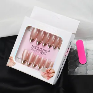 French tip press-on nails set in nude pink with gold edges, file and glue included