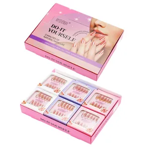 Set of six elegant press-on nail kits in blush pink, gold, and metallic silver finishes