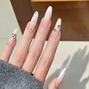 Long almond nude pink ombre press-on nails with gold dot and paw print accents