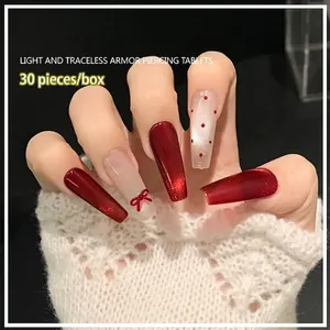 30pcs set of red cat-eye gradient press-on nails with 3D bow and dot nail art accents