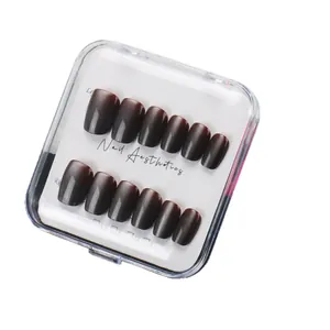 Dark red-brown cat eye press-on nails set with glossy finish in a square-oval shape