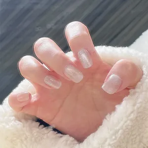 Short square milky white cat eye press-on nails with silver glitter and pearl finish