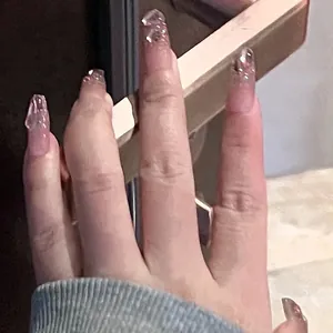 Pink gradient long press-on nails with 3D embossed relief for a soft, elegant look