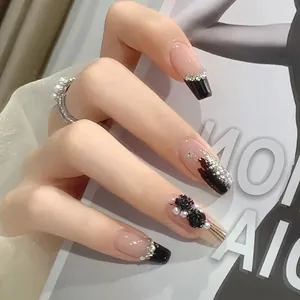 Short coffin press-on nails featuring black pink gradient with 3D roses and pearls