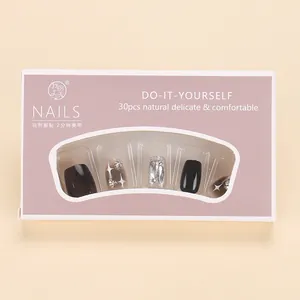 Short black aurora glitter press-on nails set with 30 pieces and sparkling diamond accents