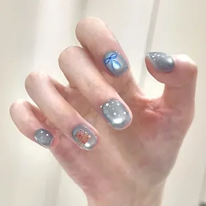 Pink and white floral press-on nails in short oval shape for a sweet cute style