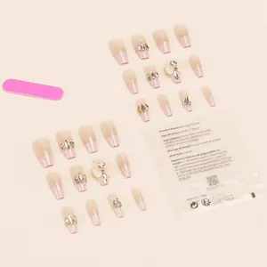 Press-on nail set with glitter bow and rhinestones includes 24 pieces and jelly glue