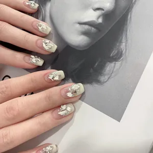Handmade milky white press-on nails with silver rhinestones and pearls decoration