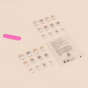 Handmade nude pink French press-on nails with glitter gradient and 24-piece glue kit