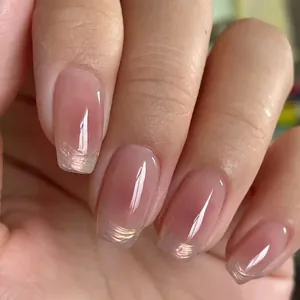 Short French blush press-on nails with aurora powder shimmer and square-oval shape