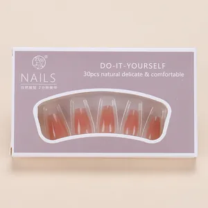 Detail of pink gradient press-on nails set with 30 pieces in lavender window box