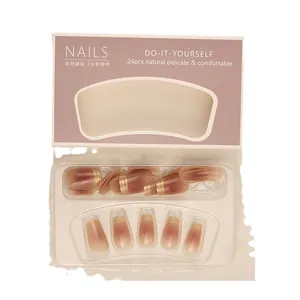 Short French blush gradient press-on nails with elegant gold wire rim accents