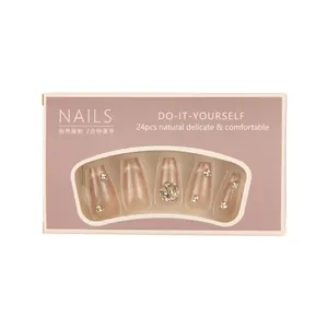 Pink cat eye press-on nails with glitter diamonds and elegant glossy finish