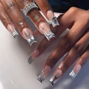 Extra long square grey tribal nails with chrome cross charms and silver studs