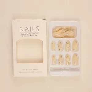 Medium length nude press-on nails set with rhinestone bows and star patterns