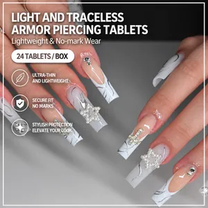 Long white French press-on nails with silver star and cross diamond decoration
