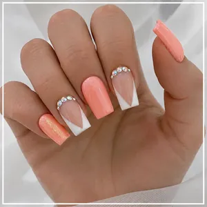 Short square orange press-on nails with glitter accents and rhinestones 24pcs set