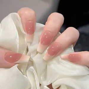 Glossy gradient pink and white french tip press-on nails in long coffin shape