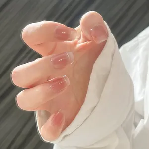Handmade gradient nude pink press-on nails with square-round shape and glossy finish