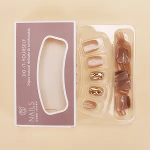 Detail of 24pcs cat-eye press-on nails in champagne glitter finish with luxury packaging