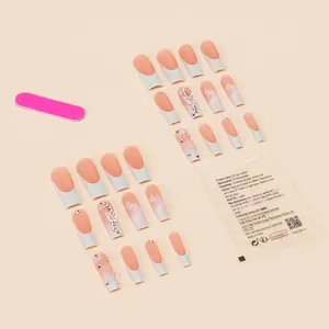 French tip press-on nails with silver butterfly charms, floral art and full tool kit