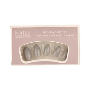 Medium length grey almond press-on nails set with 24 pieces in minimalist pink box