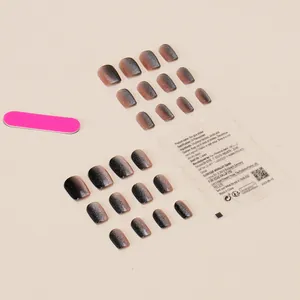 Handmade black gradient cat-eye press-on nails set with glitter finish and 24 nail tips