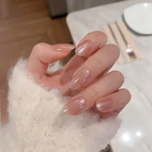 Elegant nude pink almond press-on nails with cat-eye shimmer for a luxury manicure look