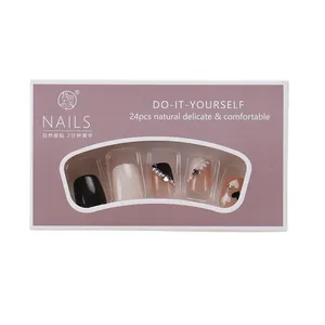 Short black French-style press-on nail kit with pearl and heart designs in 24pcs box
