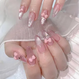 Pink cat eye handmade press-on nails with 3D bow and kitten design, long almond shape