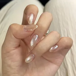 Champagne velvet cat-eye press-on nails in oval shape with elegant pearlescent finish