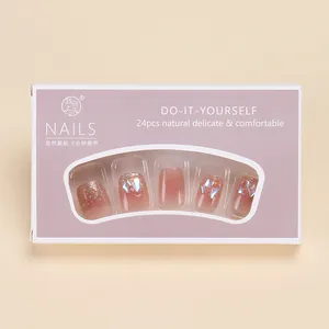 Detail view of 24pcs pink short square press-on nails with glitter gradient and shell flakes