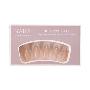 Press-on nails set featuring almond shape nude base with silver glitter French tips
