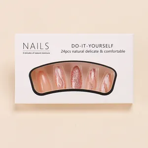 Detail of 24pcs almond press-on nails featuring rose gold glitter and pink textured designs