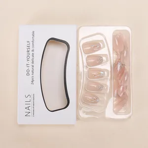Pink gradient press-on nails with glitter tips and 24pcs kit in minimalist white packaging