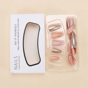 Press-on nail set featuring 24 pieces in pink glitter and French heart design on long coffin shape