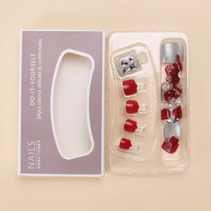 Deep red and silver glitter press-on toenails set with luxury crystal embellishments