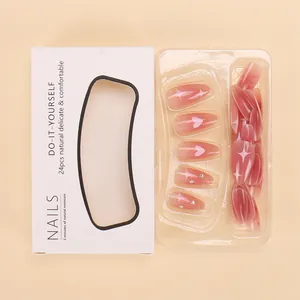 French press-on nails set with heart and star patterns in soft pink gradient finish