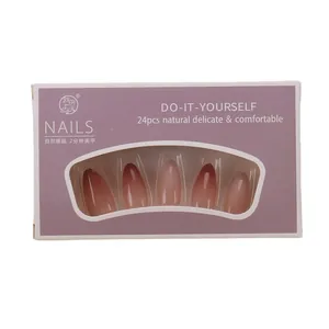 Pink and white gradient almond press-on nails set in elegant purple display box