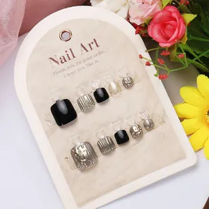 Uñas postizas de lujo para pies en color negro y plata brillante, set de 24 piezas