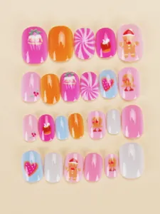 Detail of 24pcs colorful press-on nails for kids featuring cute cupcake and gingerbread patterns
