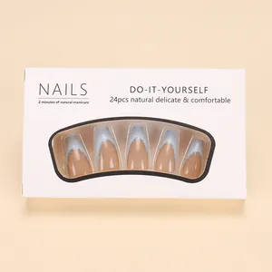 Detail of 24pcs long coffin press-on nails with blue French tips and silver glitter accents