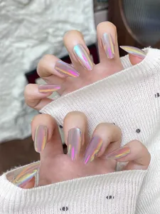 Detailed view of luxury aurora laser press-on nails with iridescent metallic shine