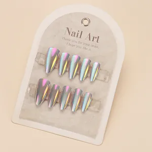 Iridescent laser chrome press-on nails in long stiletto shape on display card