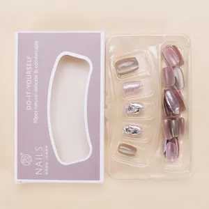 Detailed set of 30pcs cat eye press-on nails in rose pink and grey purple with glitter