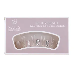 Pink cat-eye press-on nails set with silver star and bow charms in 30pcs gift box