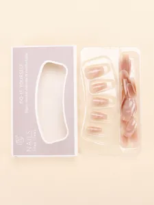 Detailed set of 30 shimmering nude pink cat eye press-on nails in elegant packaging